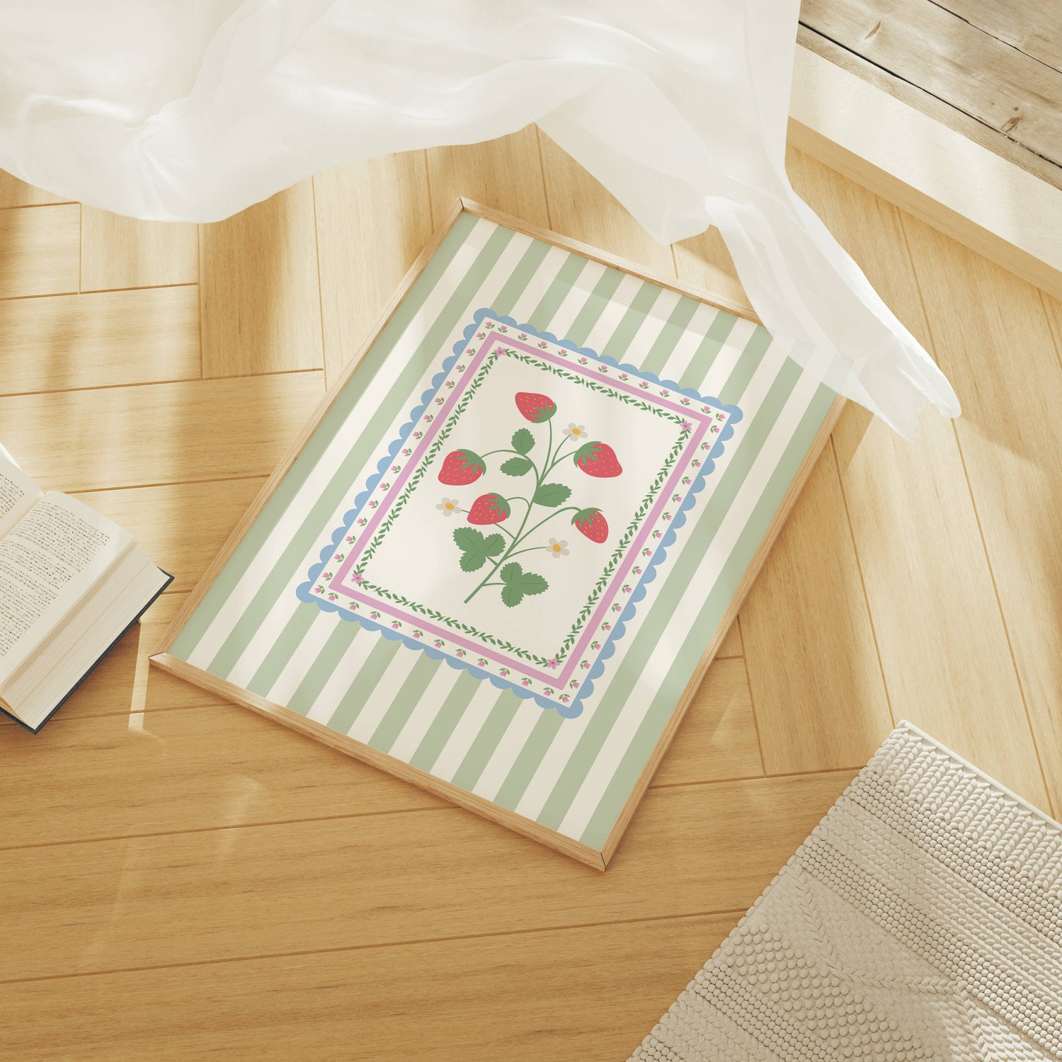 Art print with strawberry floral design on a wooden floor